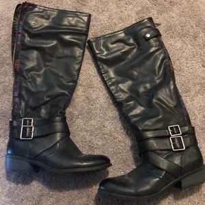black boots with colorful zipper detail